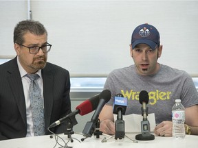 Lawyer Norm Assiff and Ian Hague, Tim's brother. The family of boxer Tim Hague who died after a boxing match in 2017 in Edmonton made a statement at their lawyers office on June 17, 2019.   Photo by Shaughn Butts / Postmedia