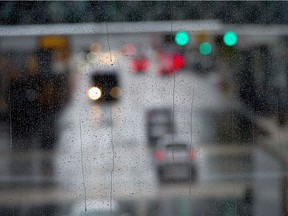 Dark and damp weather descended on the core of the city and umbrellas were common on the streets of downtown Edmonton on June 19, 2019.