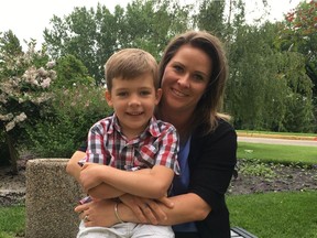 Parent Taryn McDonald, with her five-year-old son Rhys, said she's concerned her children's school will be losing a mental health therapist next year. McDonald, who is chair of Horse Hill school's parent council, said budget concerns prompted the Edmonton public school district to eliminate the position.