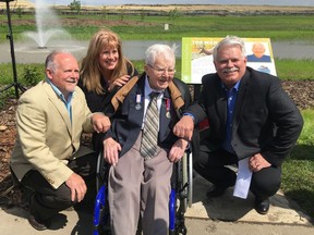 Gordon King, a 99-year-old Second World War veteran who dodged death several times during war, is honoured on Saturday, June 22 as the City unveils streets and a pond named after him in the new Keswick subdivision. King is surrounded by three of his children: Richard (left), Cathy, and Chris (right).