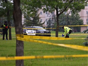 Police on the scene investigating a pedestrian collision involving a teen that was sent to hospital with serious injuries after being chased and struck by a vehicle in a field next to Kirkness School early Monday morning in northeast Edmonton, June 24, 2019.
