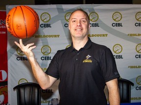 Edmonton Stingers head coach and general manager Barnaby Craddock poses after a media conference on Wednesday, Feb. 20, 2019.