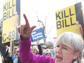 Pro oil and pipeline supporters protest against Bill C-69 in Calgary in April.