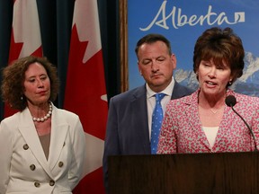 Alberta Energy Minister Sonya Savage speaks to media regarding the federal decision on Bill C-69 while Bronwyn Eyre, Saskatchewan Minister of Energy and Resources and Greg Rickford, Ontario Minister of Energy, Mines and Northern Development listen on Wednesday.