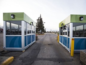Empty parking kiosks are seen at Northlands in Edmonton, Alta. on Thursday, Oct. 8, 2015.