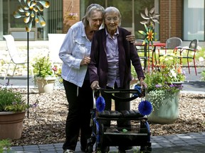 Janet Palmer, left, and her mother Mary Palmer, 99, a resident living with dementia at Canterbury Court seniors home in Edmonton. A new expansion at the home will improve the lives of residents with dementia by using the built environment, smells, sounds and materials to allow them to live out their lives with purpose and in familiar, home-like surroundings.