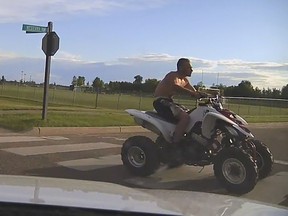 Police in Stony Plain are searching for a man who was driving a white quad dangerously driving around the Stony Plain Composite High School last week. (RCMP handout photo)