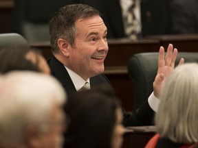 Premier Jason Kenney waves to the public gallery as Lieutenant Governor of Alberta Lois E. Mitchell opens the first session of the 30th Alberta Legislature with the Speech from the Throne, in Edmonton Wednesday May 22, 2019.