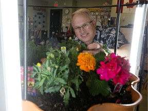 Thorsby Elementary School teacher Brian Stern looks at a grow tower in one of the school's classrooms, in Thorsby Alberta Thursday June 6, 2019.