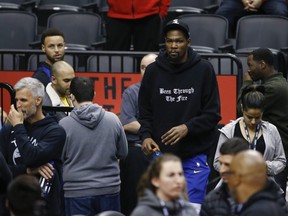 Golden State Warriors Kevin Durant (R) and Steph Curry come on to the court for practice in Toronto, Ont. on Saturday June 1, 2019.