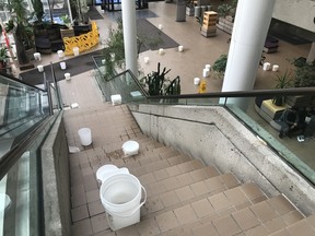 A picture posted to social media by an Edmonton criminal defense lawyer shows water leaking from the ceiling in the lobby of the Edmonton Law Courts building on Wednesday, June 19.