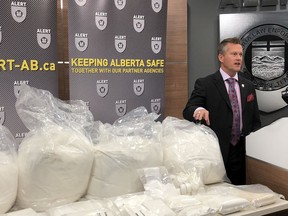 The Alberta Law Enforcement Response Teams (ALERT) showed a stash of cocaine, ketamine and cutting agent phenacetin seized in June 2019 from two Edmonton residences during a July 18 news conference. The drugs are worth $1.4 million, said Insp. Marc Cochlin, executive officer in charge of ALERT in Edmonton.