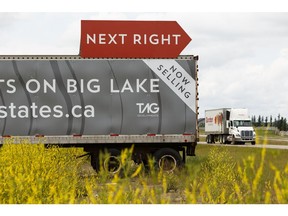 A semi-trailer used for advertising on the south side of Yellowhead Highway between Range Roads 262 and 261 west of Edmonton on Monday, July 8, 2019.