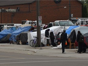 The tent city on 95 street near 106 Ave has disappeared but there's another along 105A Avenue across the street from the Hope Mission in Edmonton, July 9, 2019.