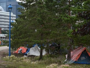 The tent city on 95 street and 106 Ave has disappeared but here's another along small gathering of tents not far away next to the LRT tracks in Edmonton, July 9, 2019.