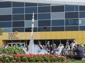 At over five feet tall, a 1/70 scale model of the Saturn 5 rocket flew up to about 500 feet and broke into two pieces before it fell back to earth. To celebrate the 50th Anniversary of NASA's Apollo 11 mission to land on the Moon, the Telus World of Science launched 50 model rockets in front of the building on July 16, 2019.