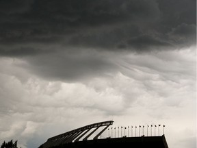 Thunder clouds gather over Commonwealth Stadium in Edmonton, on Wednesday, July 17, 2019.