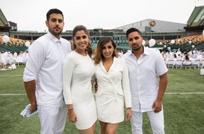 (From left) Sunny Singh, Berneta Randhawa, Sabrina Atwal and Romeo Deol during Le Diner en Blanc at Commonwealth Stadium.