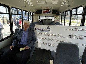 Dr. Bob Turner (seated) made a $150,000 donation in support of the Winter Warming Bus at Boyle Street Community Services in Edmonton on Wednesday July 31, 2019. The donation will help to ensure that Edmonton's most vulnerable citizens have a safe and warm roving drop-in space available to them during the winter. Last year the Boyle Street Winter Warming Bus helped 649 clients access services like food, shelter, and connection to other support services. Over half of the individuals accessing the Winter Warming Bus reported having been sleeping rough during the winter.