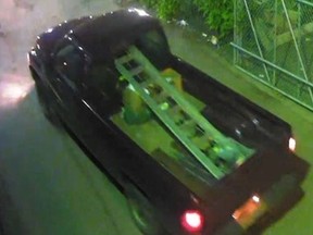 Surveillance Images capture a "person of interest" and a maroon-coloured Dodge Ram pick-up truck outside of the Boyle Street Community Services building on May 27, 2019. A fire was set on the roof of the building in the early-morning hours on May 27, 2019.  It has since been deemed an arson.