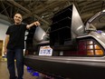 Lech Lebiedowski, Alberta Aviation Museum curator, with his Back to the Future DMC DeLorean hero car during setup at the Alberta Aviation Museum in Edmonton on Friday, July 5, 2019.