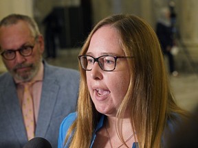Alberta NDP MLA Christina Gray (right, NDP Opposition Critic for Labour) and David Harrigan (left, Director of Labour Relations, United Nurses of Alberta) comment on the Bill 9 injunction at the Alberta Legislature on Wednesday July 31, 2019.  An Alberta justice has put a temporary halt to the province’s controversial Bill 9 as it relates to the Alberta Union of Provincial Employees. (PHOTO BY LARRY WONG/POSTMEDIA)
