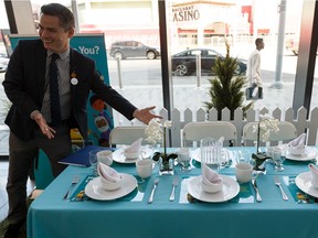 Edmonton Coun. Aaron Paquette shows a meal kit at Edmonton Tower on Friday, July 12, 2019, during the 2019 launch for Hello, Let's Eat! a service that promotes social connectedness and mental health by providing free meal kits and resources to Edmontonians.