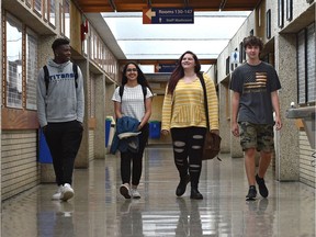 From left, David Agbey, 15, Rawan Osama, 18, Cameron Wright, 18 and Max Deib, 16, all attend summer school at Harry Ainlay, as enrolment is ballooning in the public and Catholic summer school programs in Edmonton.