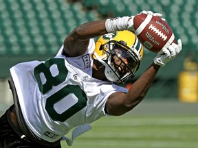 DaVaris Daniels makes a diving catch during the Edmonton Eskimos training camp on Tuesday May 21, 2019 at Commonwealth Stadium in Edmonton.