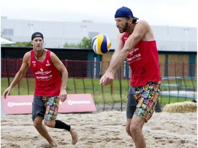 Team USA's John Hyden, left, and Ryan Doherty play Team Austria's Maximilian Trummer and Felix Friedl during the FIVB Beach Volleyball World Tour, in Edmonton Thursday July 18, 2019.