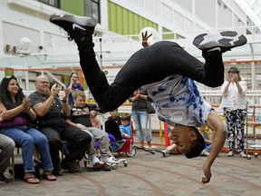 Sean Arceta from the Edmonton International Street Performers Festival performs a dance while visiting the Stollery Children's Hospital on Wednesday July 10, 2019. (PHOTO BY LARRY WONG/POSTMEDIA)