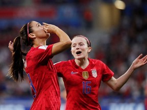 Alex Morgan of the U.S. celebrates scoring their second goal with Rose Lavelle in the semifinal of the 2019 FIFA Women's World Cup at the Stade de Lyon in Lyon, France on Tuesday, July 2, 2019.