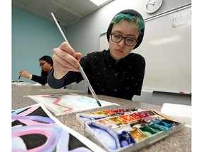 Kellin Johnson participates in an art program at the Bill Rees YMCA in Edmonton, where an announcement of a $5 million gift from the Stollery Children's Hospital Foundation to the Mental Health Foundation to support youth mental health in Alberta was made on Wednesday, July 3, 2019.