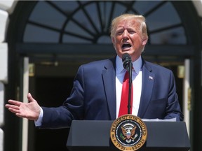 U.S. President Donald Trump speaks at the third annual "Made in America Product Showcase" on the South Lawn of the White House in Washington, U.S., July 15, 2019. REUTERS/Leah Millis ORG XMIT: WAS113