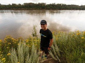 Jason Britton, who runs SwimRun Edmonton, poses for a photo in Government House Park in Edmonton, on Thursday, Aug. 1, 2019. The race mixes 17 kms of running with 6 kms swimming in the North Saskatchewan River. Photo by Ian Kucerak/Postmedia
