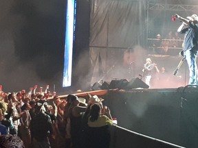 Toby Keith hoists a Red Solo Cup to his fans during a performance of the song Friday night at Big Valley Jamboree in Camrose.