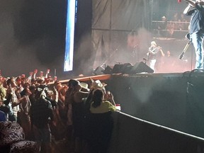 Toby Keith hoists a red solo cup to his fans during a performance of the song at Big Valley Jamboree in Camrose.