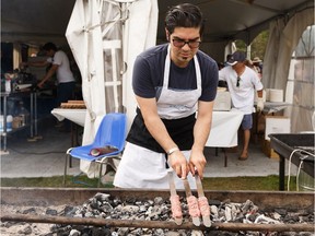 Reza Akbari makes traditional kebabs at the Persia and Iran pavilion during the last day of Heritage Festival at Hawrelak Park in Edmonton, on Monday, Aug. 5, 2019.