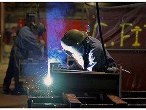 A welder at work at Waiward Industrial, one of Western Canada's largest construction companies.