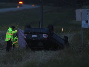 Police at the scene of a fatal vehicle rollover at 195 Ave and 18 Street on Wednesday, Aug. 8, 2019.