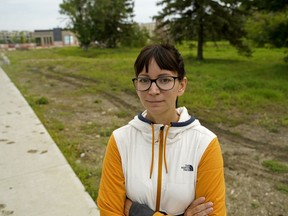 Shelby Corely (President, Griesbach Community League) beside a site owned by the Sobey's grocery store company. Residents in the community of Griesbach in north Edmonton are hoping to initiate federal and provincial changes needed to act on caveats. These legal agreements are hurting communities by allowing grocery stores and other businesses to sterilize land for years.