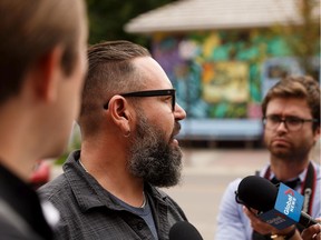 Fringe Theatre Executive Director Adam Mitchell speaks about the removal of support for the show Who Goes There? written by playwright David Belke during a press conference in Edmonton, on Friday, Aug. 9, 2019. Belke has been convicted of possession of child pornography.
