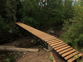 Gold Bar Park's illegitimate but popular mountain biking bridge is coming down. The City of Edmonton confirmed the unsanctioned structure linking a popular mountain biking route would be coming down on Friday after someone notified the city back in June. While the bridge may appear official, it didn't receive approval or meet safety requirements. The cycling community attempted to change the city's mind in a last-ditch email blitz to Coun. Ben Henderson but the bridge's fate was sealed.