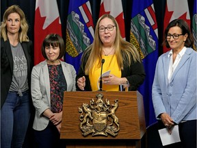 Official Opposition labour critic Christina Gray, centre, called on the UCP government to appoint more people to the province's minimum wage panel, Tuesday, Aug. 27, 2019. Gray recommended (left to right) Katy Ingraham, Susan Cake and Susan Morrissey, among others for the panel.