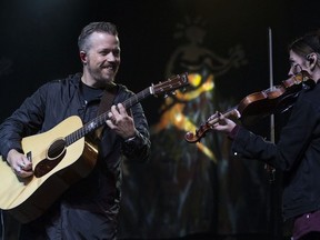 Jason Isbell and his wife Amanda Shires perform on the main stage during the second day of the Edmonton Folk Music Festival in Gallagher Park, Friday Aug. 9.