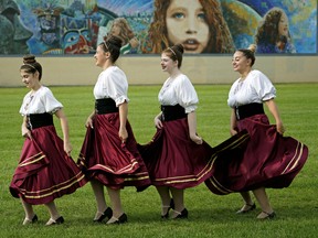 Members of the Italian Appennini Dancers, Anelise Tavano, Olivia Martino, Isabella Tavano and Sadie Robinson (left to right), rehearse their dancing at Giovanni Caboto Park in preparation for the annual summer Italian festival in Edmonton. The Italian Youth Association is organizing "Festa Italiana" at the park on Sunday August 25, 2019. (PHOTO BY LARRY WONG/POSTMEDIA)