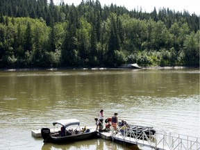 Boaters use the newly installed dock along the North Saskatchewan River, in Edmonton's Laurier Park Wednesday Aug. 14, 2019.