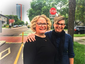 City of Edmonton lead urban strategist Charity Dyke (left) and City Plan director Kalen Anderson photographed on 102 Avenue, just east of 124 Street, recommended to be the new outer boundary of the central core. Photo taken Aug. 19, 2019.