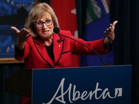 Former Saskatchewan finance minister Janice MacKinnon speaks on the report she chaired on the state of Alberta's finances at the McDougall Centre in Calgary on Tuesday Sept. 3, 2019.