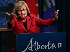 Former Saskatchewan finance minister Janice MacKinnon speaks on the report she chaired on the state of Alberta's finances at the McDougall Centre in Calgary on Tuesday Sept. 3, 2019.